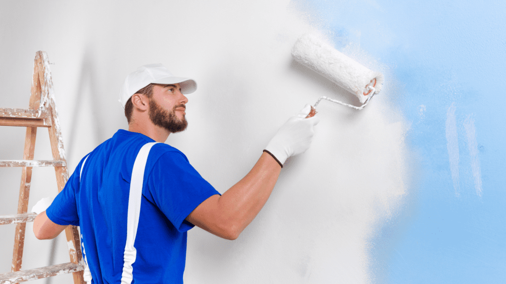 painter painting a home