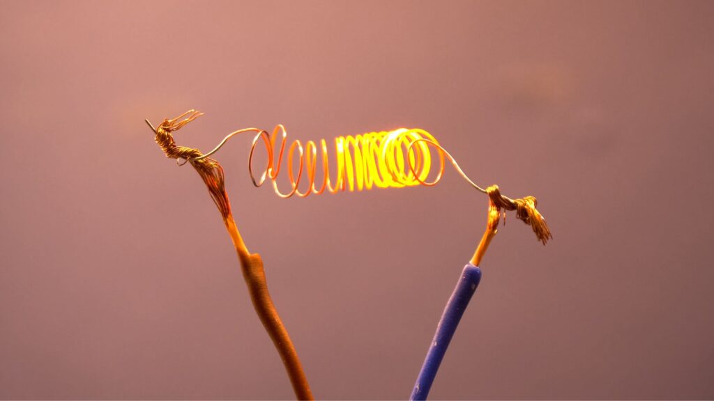 Electrical current flowing through a glowing wire