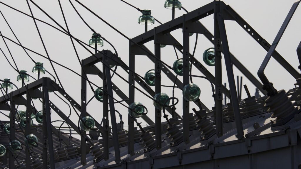 Glass insulators on electrical equipment preventing the flow of electricity