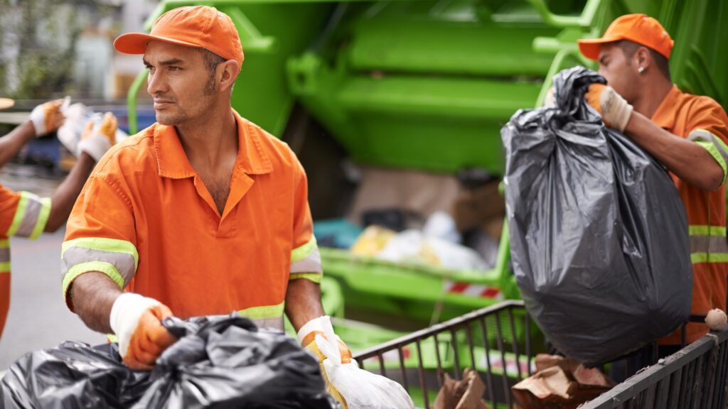 Garbage Collectors Working, Highlighting Top Paying States for Garbage Men