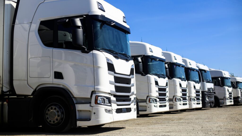 Fleet of trucks ready for new truck drivers starting their career in 2024 with proper training and licenses