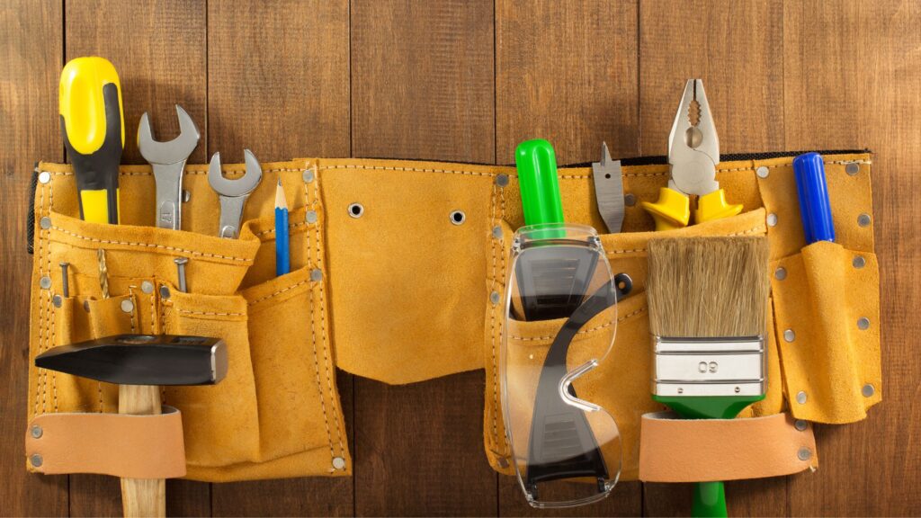 Leather tool belt with various tools showing durability, material quality, and storage organization for the best tool belt