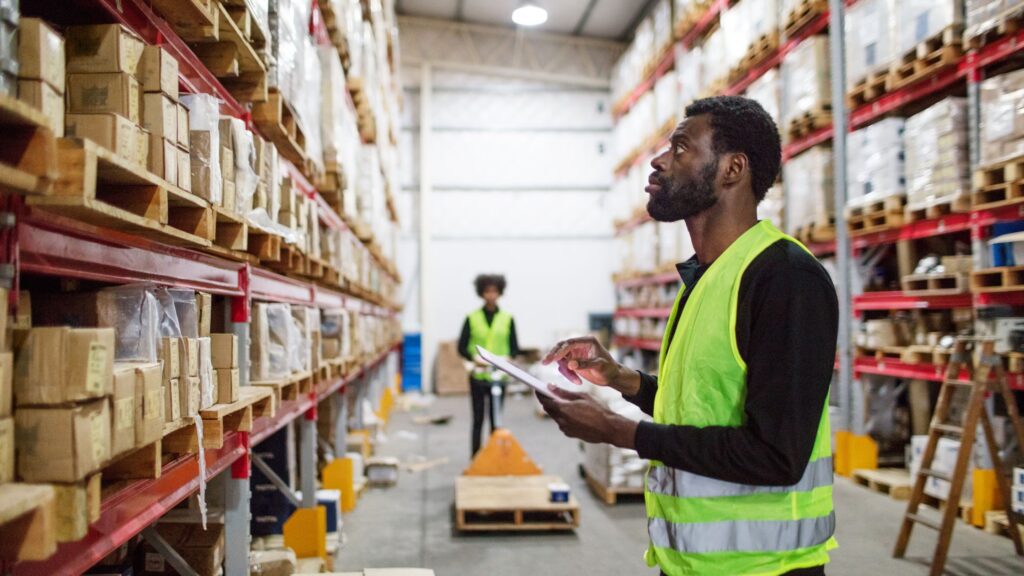 Worker reviewing tool inventory for a maintenance schedule, key for how to maintain tools effectively