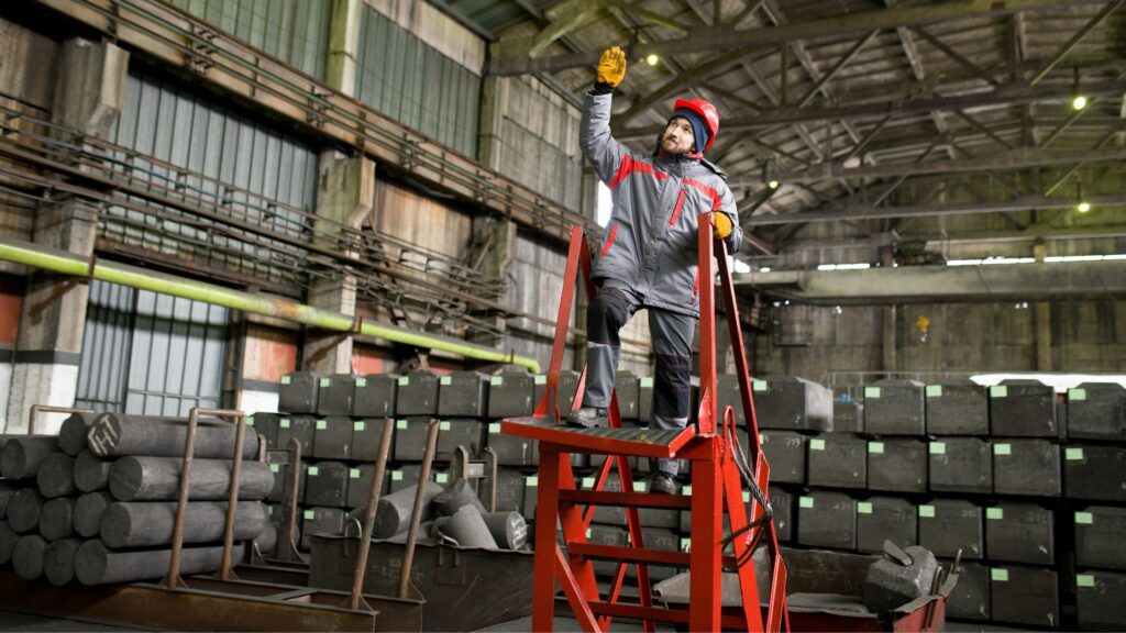 Trade professional using a step ladder for elevated tasks, emphasizing safety and stability in different trades